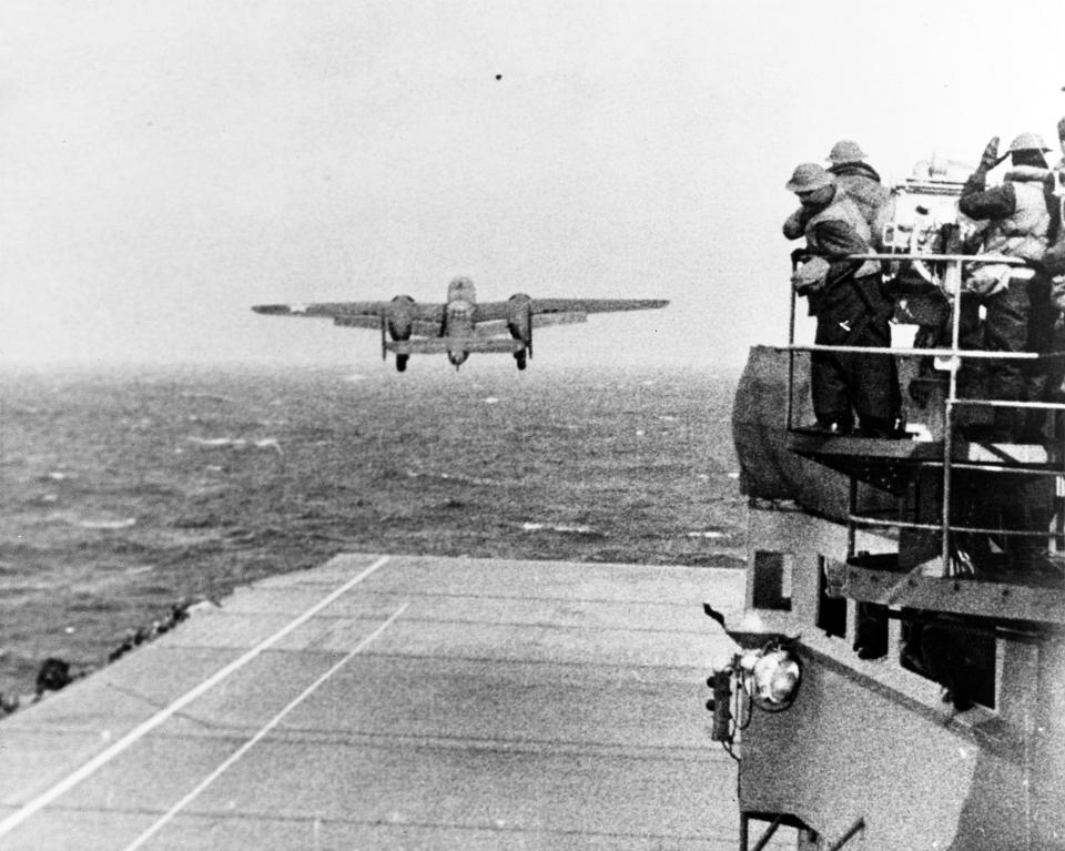 An Army Air Force B-25 bomber takes off from USS Hornet at the start of the Doolittle Raiders attack on Japan on April 18, 1942.