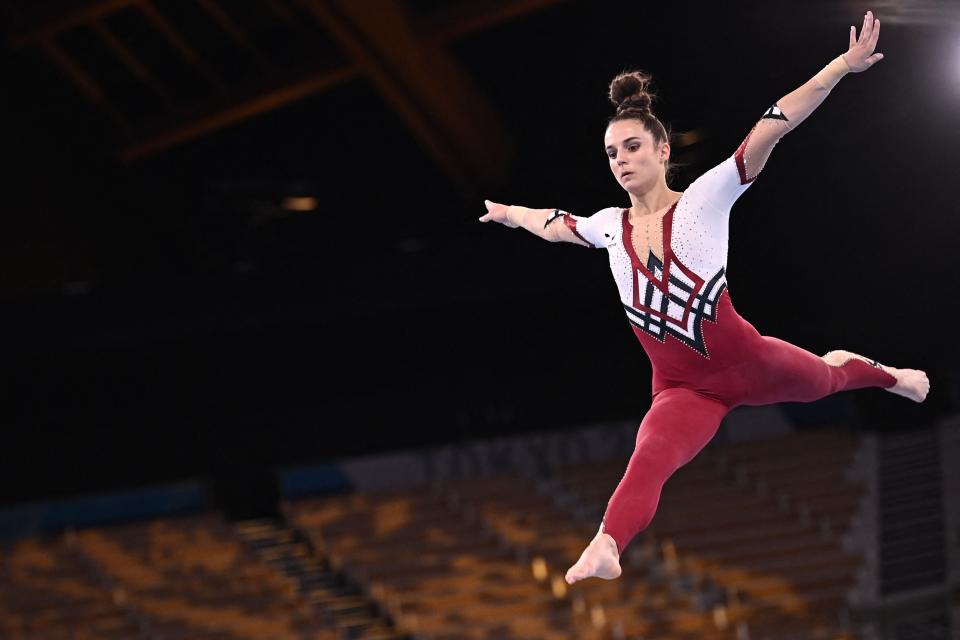 German gymnast Pauline Schaefer-Betz competes in a unitard at the 2020 Tokyo Olympics.
