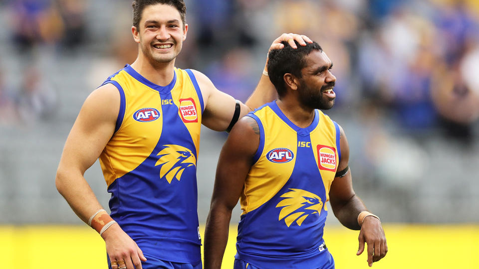 Tom Barrass celebrates West Coast's round eight AFL victory with teammate Liam Ryan.