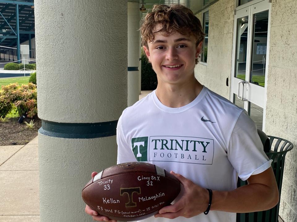 Trinity junior kicker Kellan McLaughlin poses holding the game ball of Trinity's 33-32 win over St. Xavier (Cincinnati) on Oct. 4 2021.