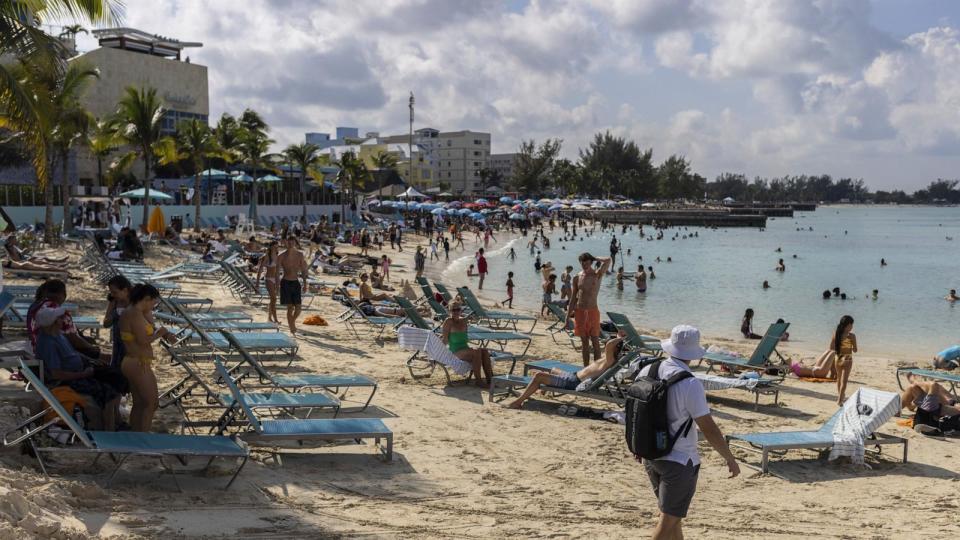 PHOTO: Tourists at a beach in Nassau, Bahamas, on Dec. 22, 2022.  (Victor J. Blue/Bloomberg via Getty Images, FILE)