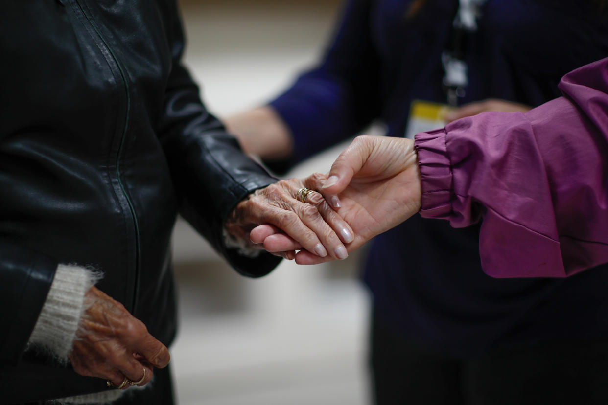 power of attorney Alzheimer's patients hands are seen at the Village Landais Alzheimer site in Dax, France, September 24, 2020. Picture taken on September 24, 2020. REUTERS/Gonzalo Fuentes