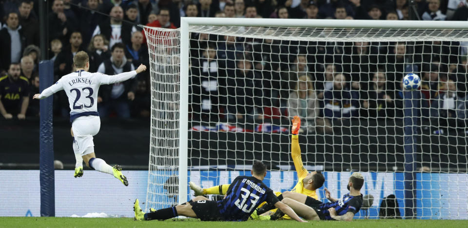 Tottenham midfielder Christian Eriksen scores the opening goal during the Champions League group B soccer match between Tottenham Hotspur and Inter Milan at the Wembley stadium in London, Wednesday, Nov. 28, 2018. (AP Photo/Alastair Grant)