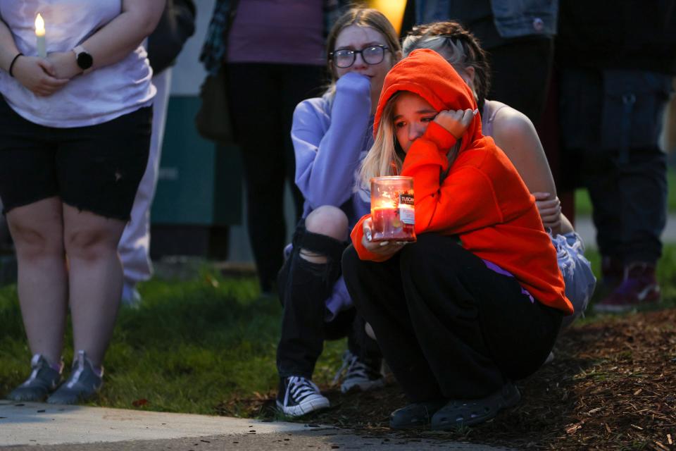 Samantha Kranz cries during a vigil held for Serena Brenneman at West Salem High School in Salem, Ore. on Tuesday, Sept. 27, 2022. Brenneman and Knanz were in the marching band together. 