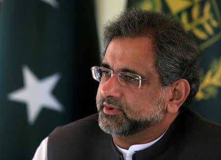 FILE PHOTO: Pakistan's Prime Minister Shahid Khaqan Abbasi speaks with a Reuters correspondent during an interview at his office in Islamabad, Pakistan September 11, 2017. REUTERS/Faisal Mahmood/File Photo