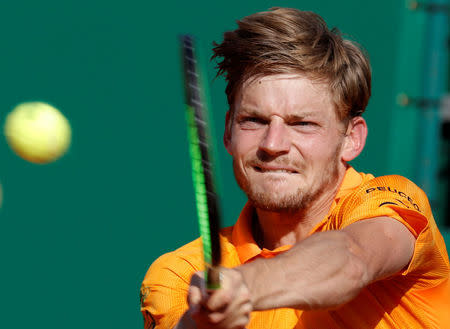 Tennis - Monte Carlo Masters - Monaco, 22/04/2017. David Goffin of Belgium plays a shot to Rafael Nadal of Spain. REUTERS/Eric Gaillard