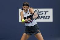 Mar 20, 2019; Miami Gardens, FL, USA; Victoria Azarenka of Belarus hits a backhand against Dominika Cibulkova of Slovakia (not pictured) in the first round of the Miami Open at Miami Open Tennis Complex. Geoff Burke