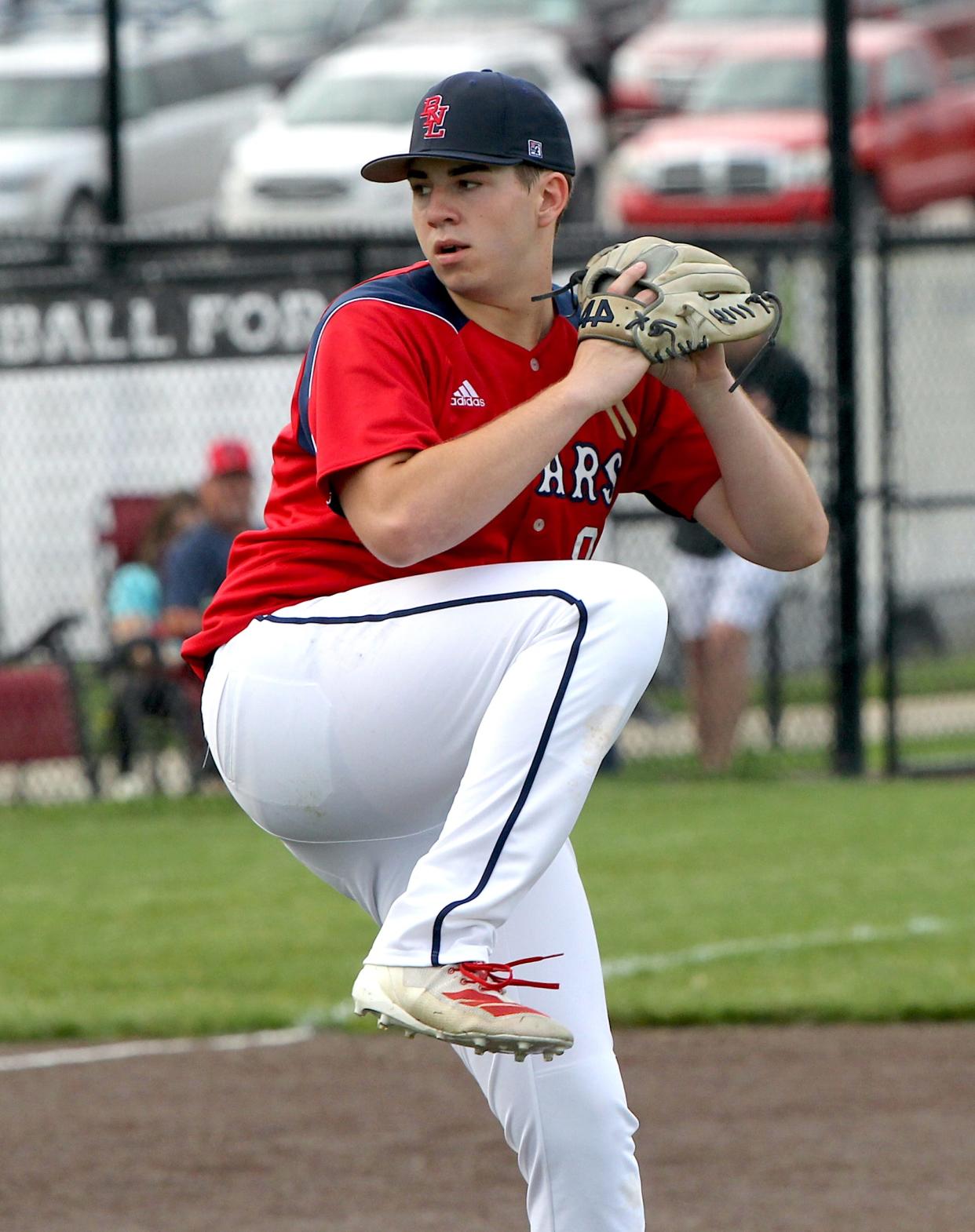 Bedford North Lawrence's Cade Mungle (8) goes through his windup in a game against Mitchell on Friday, May 3, 2024.