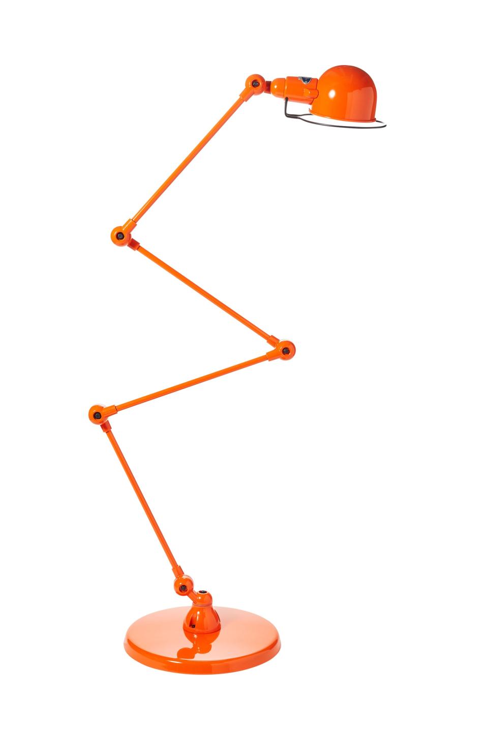 Jieldé signal zig-zag floor lamp in orange. 10" DIA. x 46.75" H.; $668. <a rel="nofollow noopener" href="https://ducducnyc.com/" target="_blank" data-ylk="slk:ducducnyc.com;elm:context_link;itc:0;sec:content-canvas" class="link ">ducducnyc.com</a>