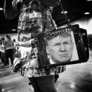 <p>A woman wears a dress and carries a purse featuring photos of Donald Trump at the candidate’s rally on Feb. 26 in Fort Worth, Texas. (Photo: Holly Bailey/Yahoo News) </p>