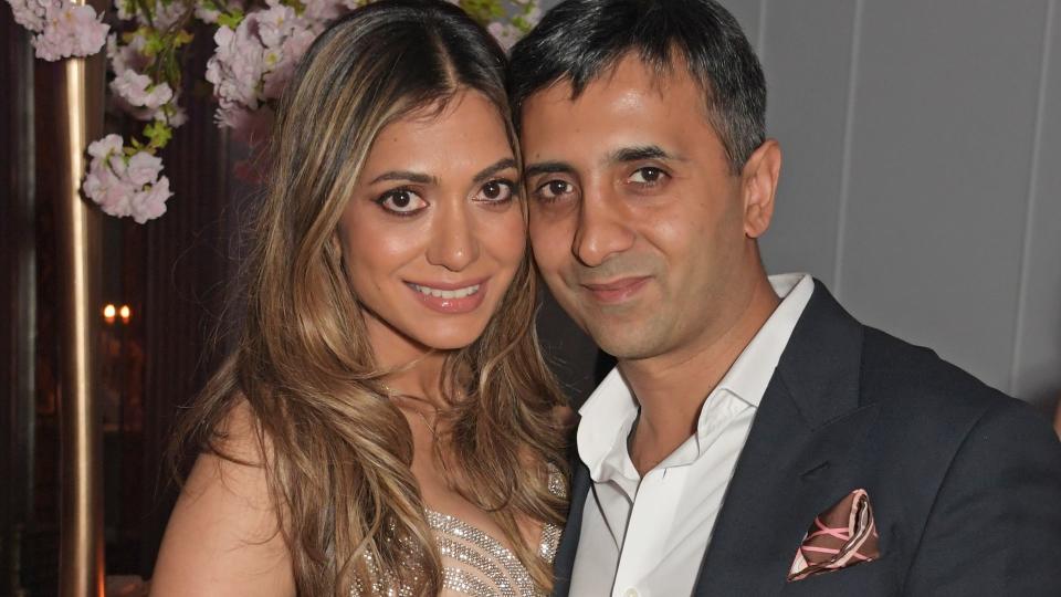 Tara Lalvani in a sparkly dress with her husband Tej Lalvani in a suit