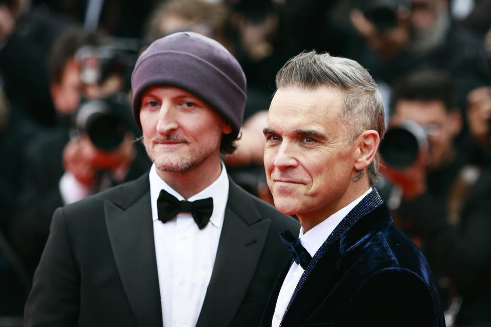 Michael Gracey and Robbie Williams at the 2023 Cannes Film Festival