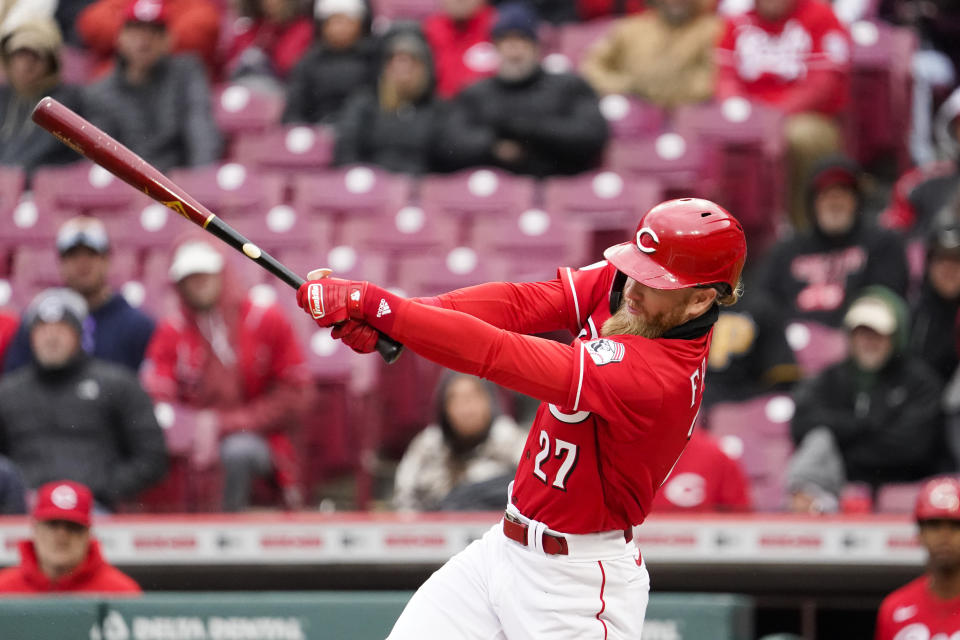 Cincinnati Reds' Jake Fraley hits a three-run home run during the sixth inning of a baseball game against the Pittsburgh Pirates, Saturday, April 1, 2023, in Cincinnati. (AP Photo/Joshua A. Bickel)
