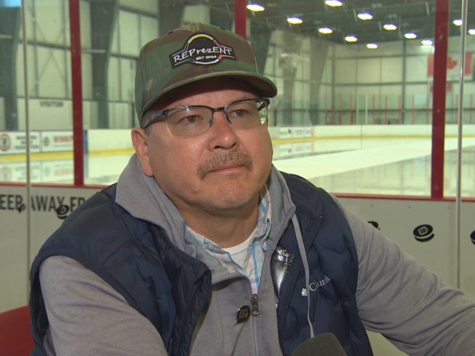 Timothy Bear, who has coached hockey and has four kids who have played in the National Aboriginal Hockey Championships over the years, said education around mental health in sports can be important. (Trevor Brine/CBC - image credit)