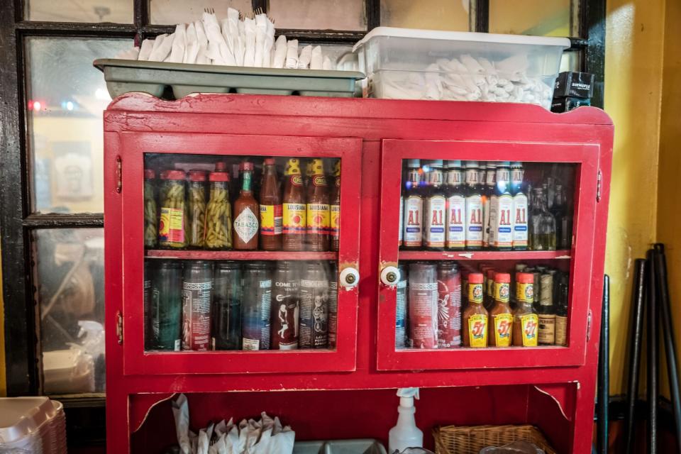 Cupboard of hot sauce