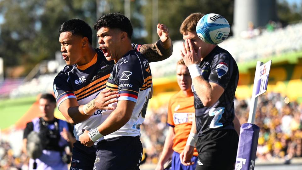 Noah Lolesio celebrates a try for the Brumbies v the Hurricanes.