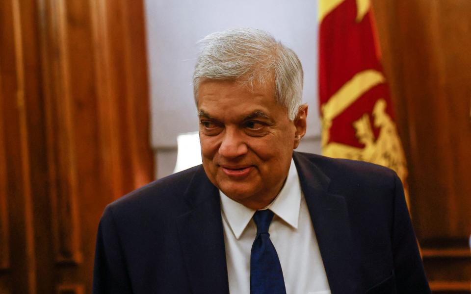 FILE PHOTO: Sri Lanka's President Ranil Wickremesinghe looks on during an interview with Reuters at the Presidential Secretariat in Colombo, Sri Lanka August 18, 2022. REUTERS/ Dinuka Liyanawatte/File Photo - DINUKA LIYANAWATTE/REUTERS