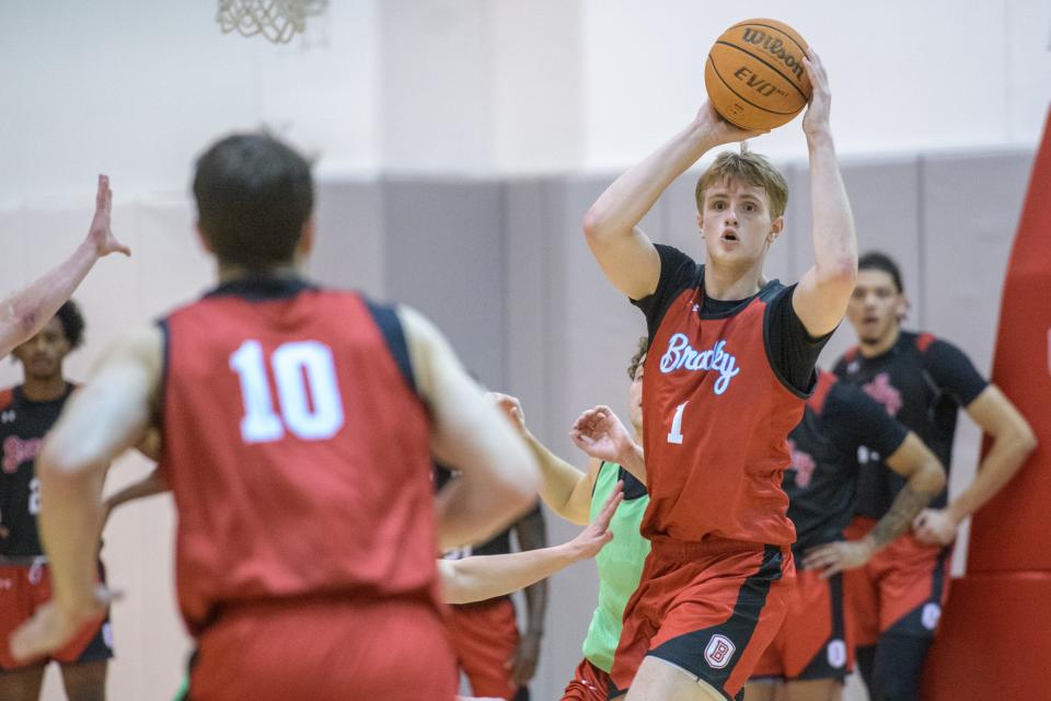 Bradley's Almar Atlason (1) looks to pass during practice Monday, Oct. 2, 2023 at Renaissance Coliseum in Peoria.