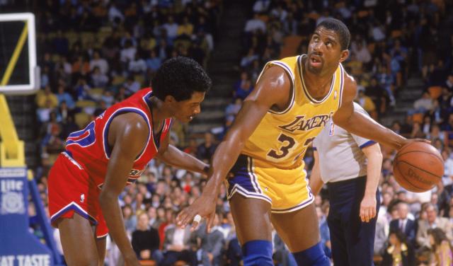 Magic Johnson of the Los Anglese Lakers competing in an NBA