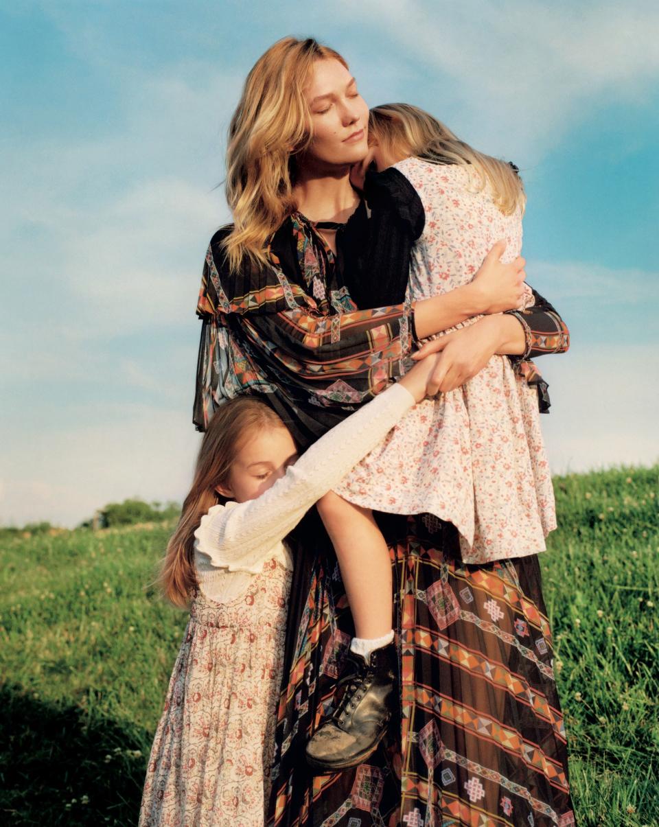“Growing up in the Midwest, my parents taught my sisters and me that kindness can move mountains,” says model Karlie Kloss, who grew up in St. Louis. Kloss, with her cousins Maddie (left) and Allie (right), wears an Etro dress, $4,475; select etro stores. On Maddie: Bonpoint dress, $215; bonpoint.com. On Allie: Polo Ralph Lauren dress, $60; Select Polo Ralph Lauren stores.