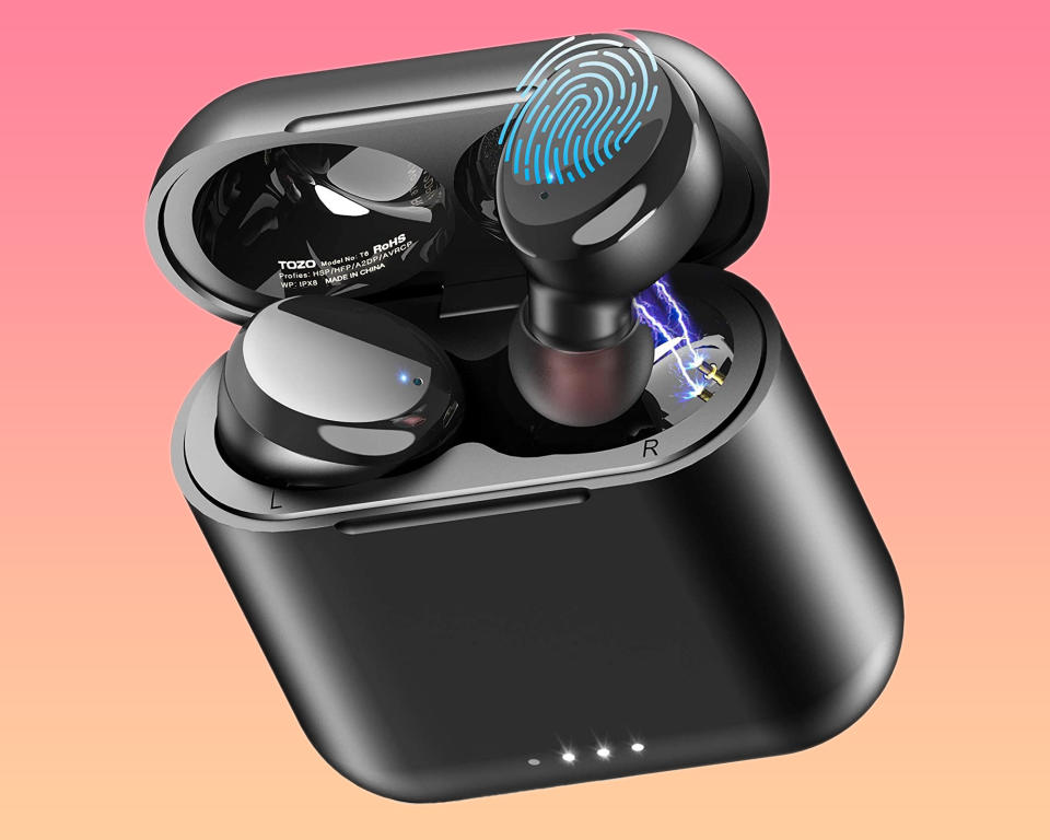 Another pair of Tozo black wireless earbuds in charging case 