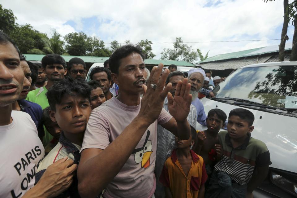 Rohingya refugee Abdul Hossain who lives in Camp 26, speaks to journalists at Nayapara camp in Cox's Bazar, Bangladesh, Thursday, Aug.22, 2019. " I'll go to Myanmar if I have the citizenship, otherwise they are going to shoot and burn us " he said. Bangladesh's refugee commissioner said Thursday that no Rohingya Muslims turned up to return to Myanmar from camps in the South Asian nation. (AP Photo/Mahmud Hossain Opu)