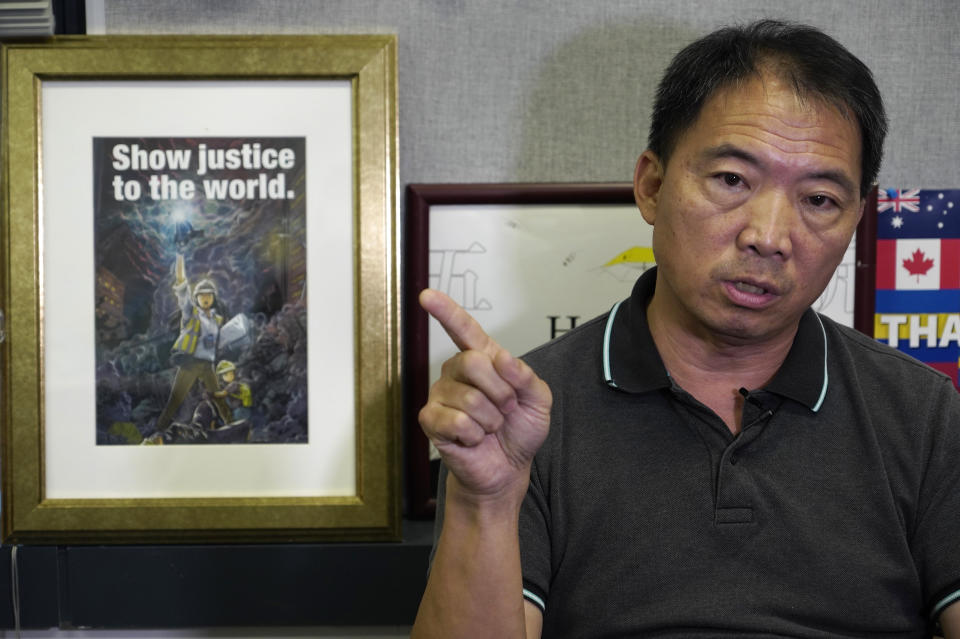 Pro-democracy lawmaker Wu Chi-wai gestures during an interview at his office in Legislative Council in Hong Kong on Nov. 19, 2020. After nearly three decades in politics, the 58-year-old Wu, chairman of Hong Kong’s largest pro-democracy party, is stepping down Monday, Nov. 30, 2020. All 15 lawmakers in the pro-democracy camp have decided to resign to protest a Beijing resolution in early November that led to the disqualifications of four of their colleagues. (AP Photo/Vincent Yu)