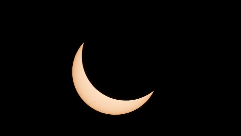 The moon obscures part of the sun during the total solar eclipse at Mann Creek Reservoir near Weiser, Idaho, on Aug. 21, 2017.