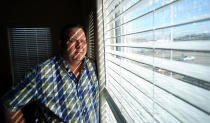 In this Thursday, Feb. 13, 2020, photo, James Kretschmer poses for a photograph before an interview in Houston. The Boy Scouts of America has filed for bankruptcy protection as it faces a barrage of new sex-abuse lawsuits. The filing Tuesday, Feb. 18, in Wilmington, Del., is an attempt to work out a potentially mammoth compensation plan for abuse victims that will allow the 110-year-old organization to carry on. Kretschmer of Houston, among the many men suing for alleged abuse, says he was molested by a Scout leader over several months in the mid-1970s in the Spokane, Washington, area. (AP Photo/David J. Phillip)