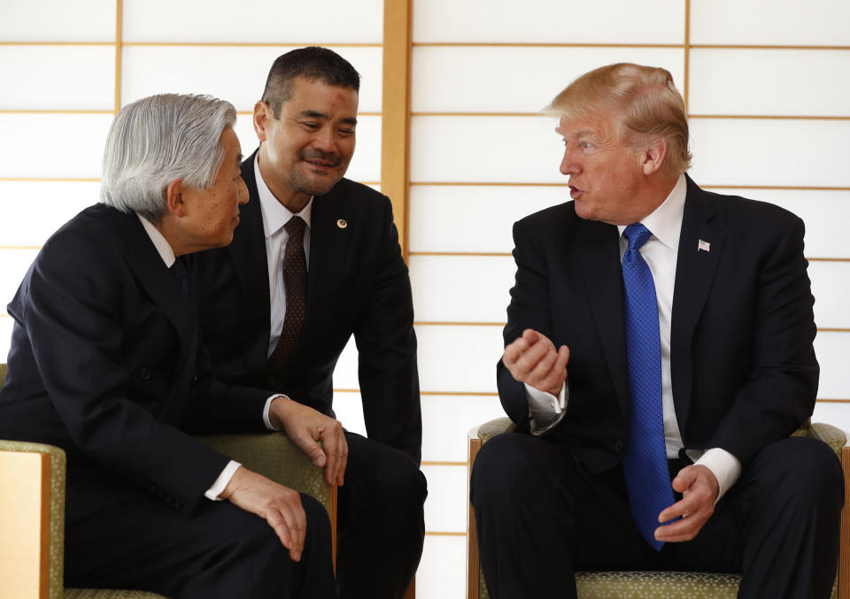 U.S. President Donald Trump, right, talks with Japan's Emperor Akihito, left, at the Imperial Palace in Tokyo, Japan Monday, Nov. 6, 2017. (Issei Kato/Pool Photo via AP)