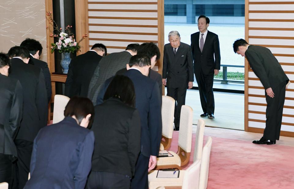 In this Dec. 20, 2018, photo, Japan's Emperor Akihito, third from right, arrives for a press conference, ahead of his Dec. 23, 2018, birthday at the Imperial Palace in Tokyo. Emperor Akihito, marking his 85th birthday — his last before his upcoming abdication — said he feels relieved that his reign is coming to an end without having seen his country at war and that it is important to keep telling younger people about his nation's wartime history. (Kyodo News via AP)