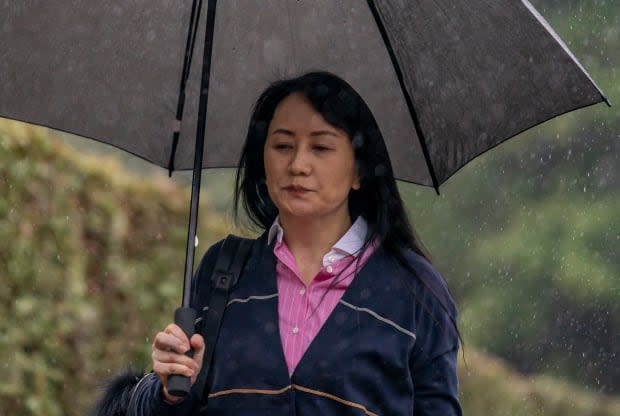 Huawei executive Meng Wanzhou makes her way from her home to B.C. Supreme Court in Vancouver.