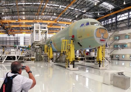 FILE PHOTO: The first U.S.-made Airbus jetliner moves down the assembly line at the company's Alabama factory in 2015