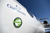 A decal stating "This Aircraft Flies On Renewable Fuel" is seen on on a Gulfstream 650ER business jet at the National Business Aviation Association (NBAA) exhibition in Las Vegas