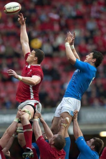 Wales lock Ian Evans (L) and Italy flanker Alessandro Zanni compete for the ball in a line out during their Six Nations rugby union match at the Millennium Stadium in Cardiff, Wales. Wales won 24-3