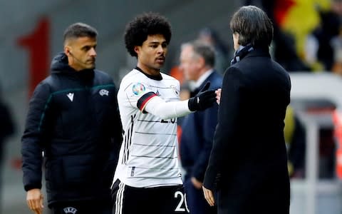 Germany's Serge Gnabry shakes hands with Germany coach Joachim Loew as he is substituted off - Credit: REUTERS