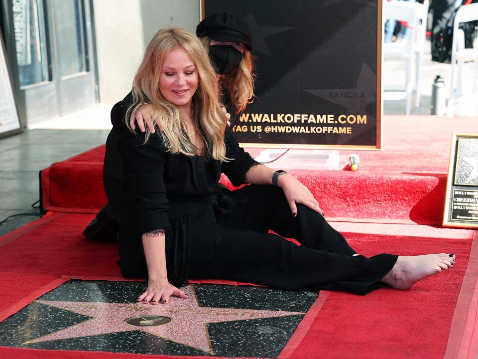 Christina Applegate and Sadie Grace LeNoble pose with Christina Applegate's star during her Hollywood Walk of Fame Ceremony in November 2022.