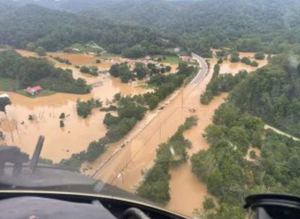 A flooded Kentucky community from a Tennessee rescue helicopter.