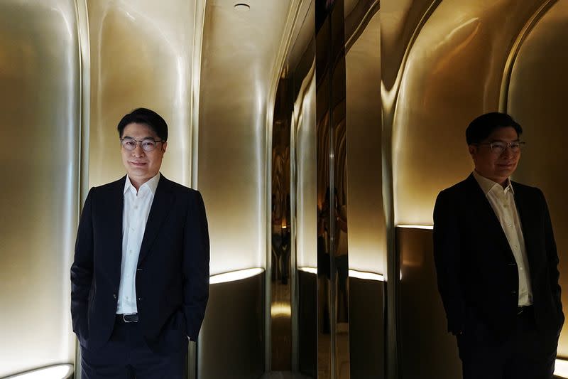 Martin Lee, co-chairman of Henderson Land Development, poses at his office in Hong Kong