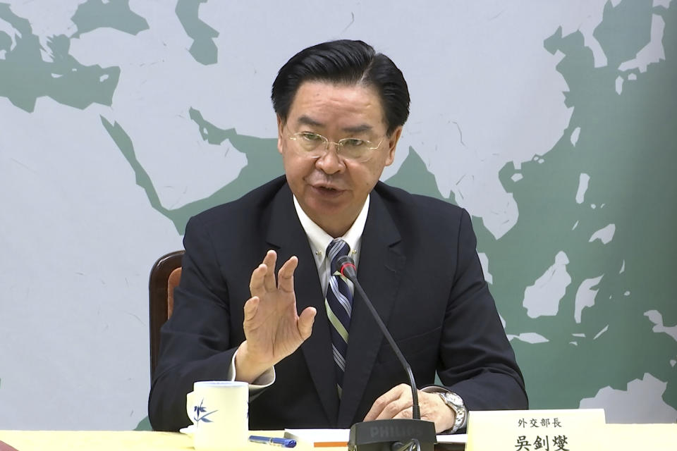 In this image taken from video, Taiwan's Foreign Minister Joseph Wu explains that Kiribati has officially notified his government that they were severing diplomatic ties with the island, Friday, Sept. 20, 2019, in Taipei, Taiwan. Kiribati's severing of ties with Taiwan is the second such loss for the diplomatically isolated island in less than a week. (AP Photo/Johnson Lai)