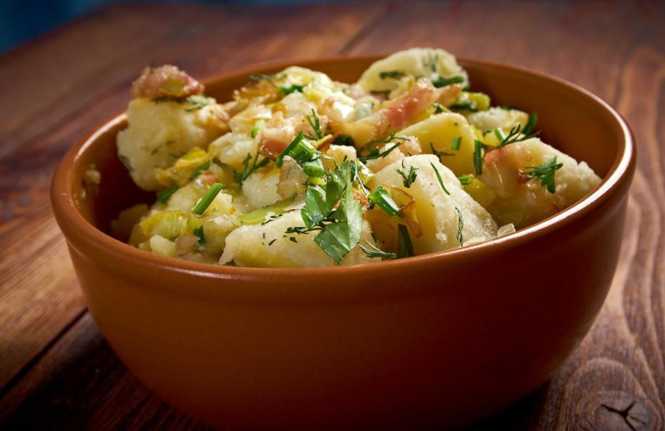 <p>This side can be served either warm or cold, but no matter which way you choose to eat this German potato salad, there’s no denying that it’s <a href="https://www.thedailymeal.com/make-ahead-meals-you-can-freeze?referrer=yahoo&category=beauty_food&include_utm=1&utm_medium=referral&utm_source=yahoo&utm_campaign=feed" rel="nofollow noopener" target="_blank" data-ylk="slk:delicious and comforting;elm:context_link;itc:0;sec:content-canvas" class="link ">delicious and comforting</a>.</p> <p><a href="https://www.thedailymeal.com/recipes/german-potato-salad?referrer=yahoo&category=beauty_food&include_utm=1&utm_medium=referral&utm_source=yahoo&utm_campaign=feed" rel="nofollow noopener" target="_blank" data-ylk="slk:For the German Potato Salad recipe, click here;elm:context_link;itc:0;sec:content-canvas" class="link ">For the German Potato Salad recipe, click here</a>.</p>