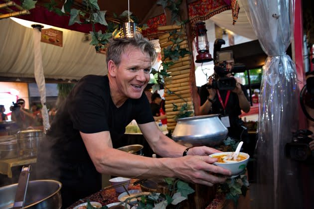 Gordon Ramsay serves up his version of 328 Katong Laksa, who he was pitted against among others in Sunday's hawker cook-off. (Yahoo! photo/Shirly Hamra)