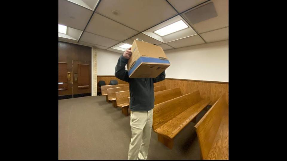 Former Diamondhead councilman Alan Joseph Moran put a box over his head to conceal his identity during a pre-trial hearing on Jan. 31 in his sex crimes case.