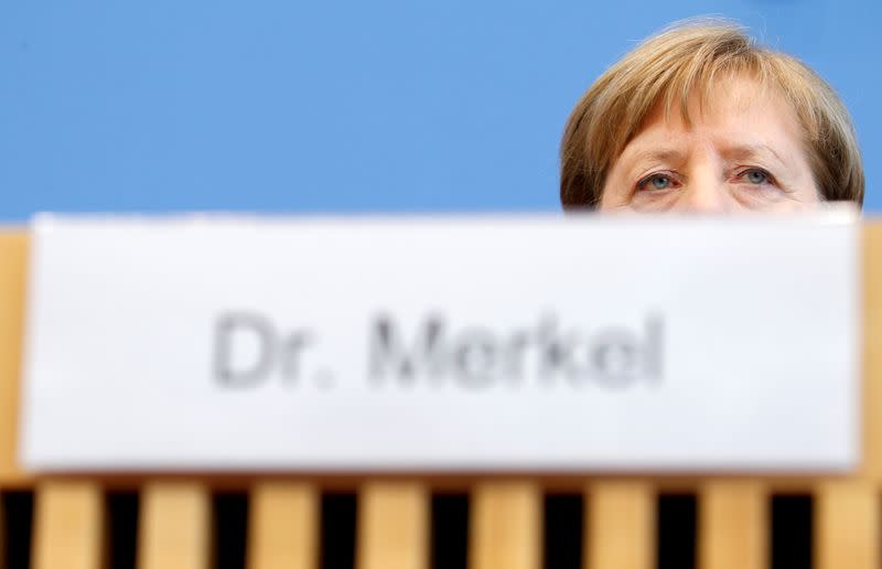 German Chancellor Merkel addresses a news conference on coronavirus in Berlin