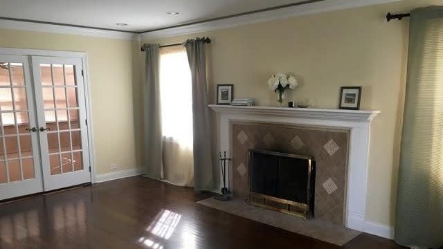 Fireplace and wood floors.