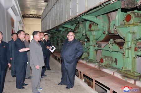 FILE PHOTO: North Korea's leader Kim Jong Un tours a factory in Sinuiju, North Korea, in this undated photo released by North Korea's Korean Central News Agency (KCNA) July 2, 2018. REUTERS/KCNA