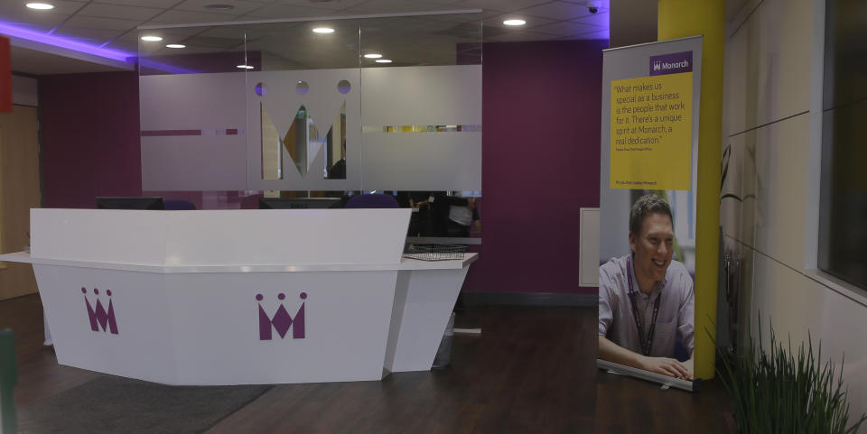 The front desk at the Luton Airport HQ of Monarch stands empty following the collapse of the airline in the early hours of Monday (AP Photo/Alastair Grant)