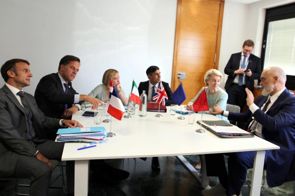 Meloni and Sunak, centre, host a meeting on migration at the European Political Community summit in October (Getty)