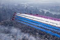 Image of the Royal Air Force Aerobatic Team, The Red Arrows flying over New York streaming the Red, White and Blue (Picture: UK MOD/Crown 2019)