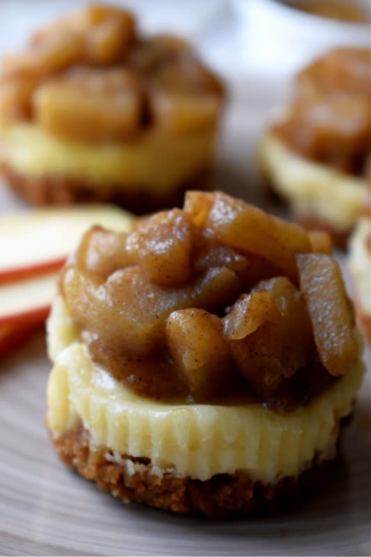 <p>Julia's Cuisine</p><p>Rich and creamy cheesecake topped with apple pie filling! These mini apple pie cheesecakes make the perfect fall dessert. A great make ahead dessert for Thanksgiving or small dinner parties.</p><p><strong>Get the recipe: <a href="https://juliascuisine.com/mini-apple-pie-cheesecakes/" rel="nofollow noopener" target="_blank" data-ylk="slk:Mini Apple Pie Cheesecakes;elm:context_link;itc:0;sec:content-canvas" class="link rapid-noclick-resp">Mini Apple Pie Cheesecakes</a></strong></p>